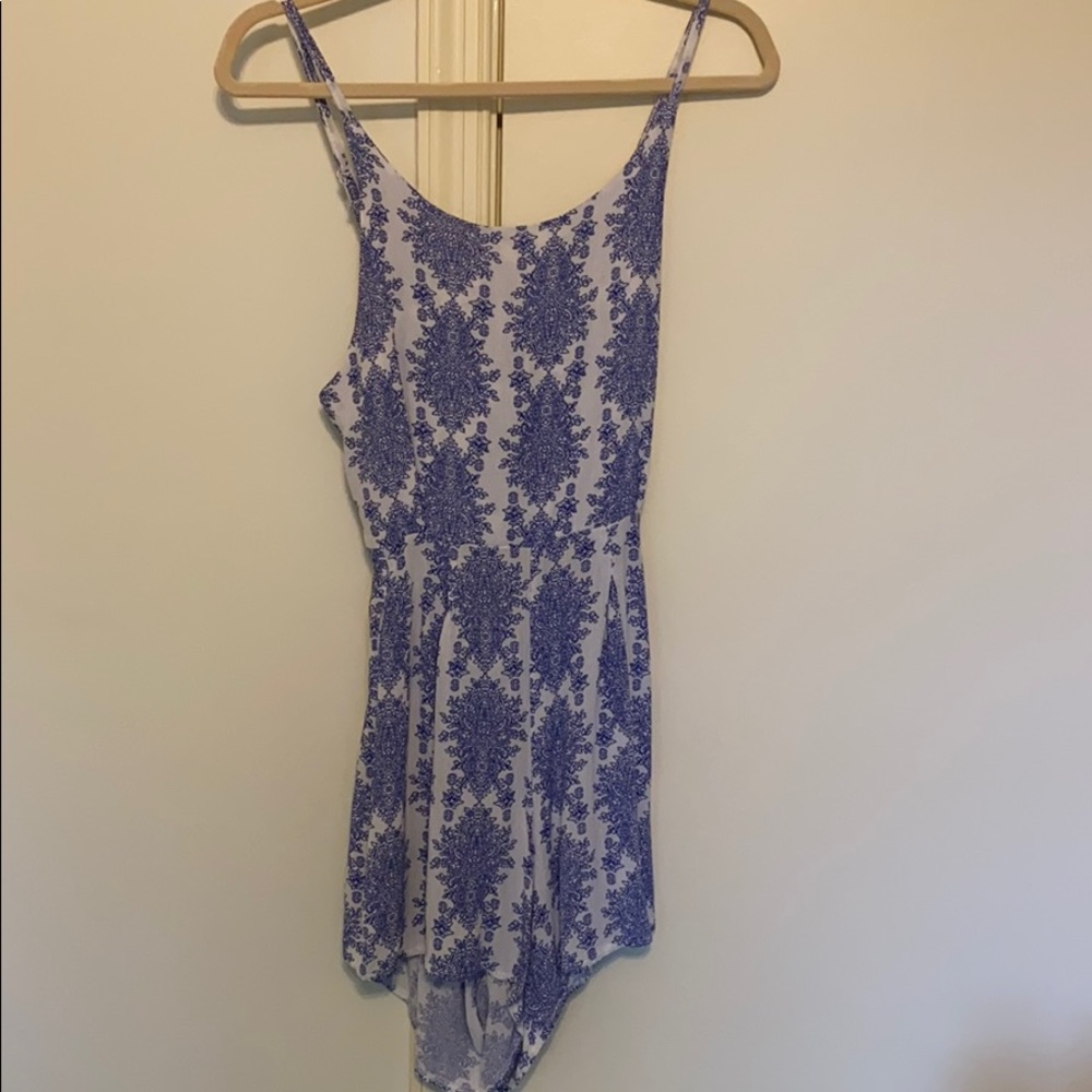 Super cute romper with a tie in the back